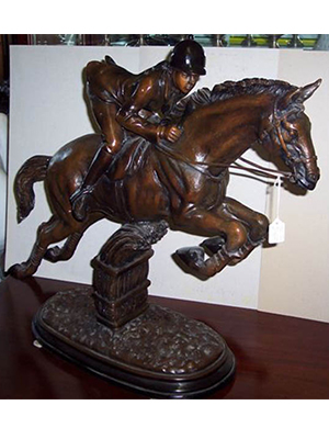 Bronze Jockey on a Horse Jumping