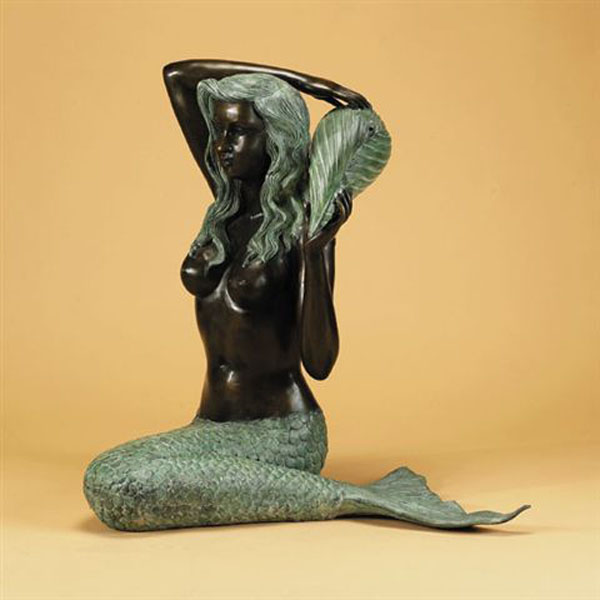 bronze mermaid figurine