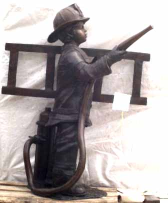 Bronze Boy Playing as a Fireman