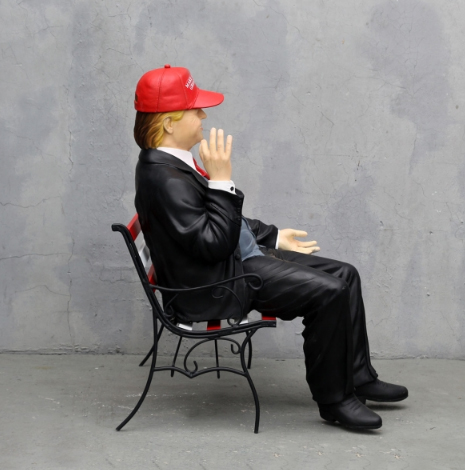 Donald Trump on Bench Wearing MAGA Hat