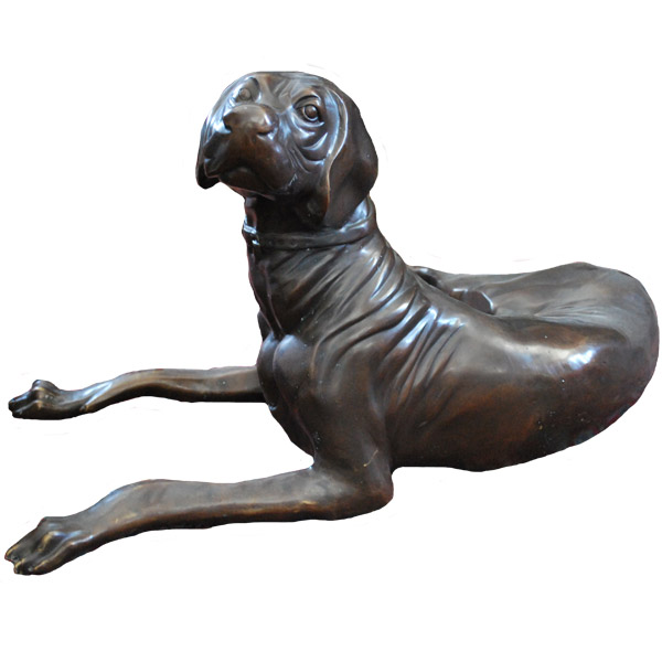 Bronze laying Dog