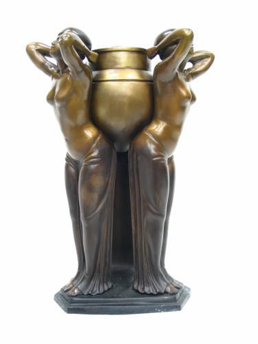 Three Women Holding Vase