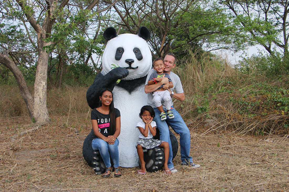 Giant Sitting Panda Bear Eating Fiberglass Statue