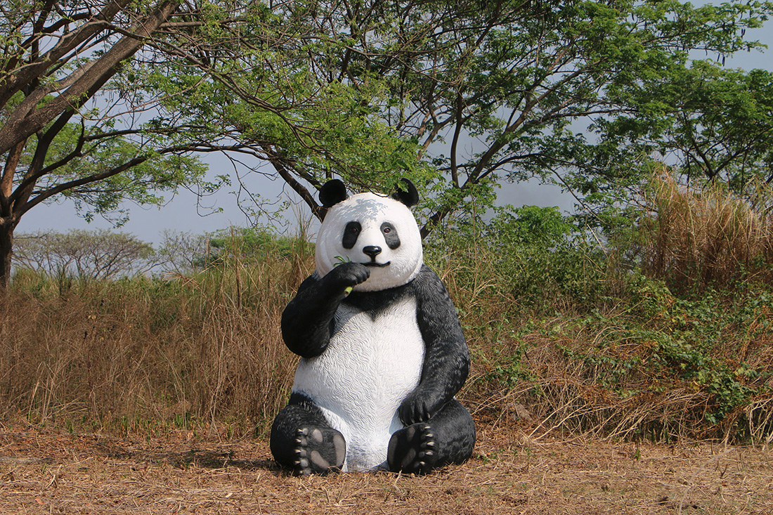 Giant Sitting Panda Bear Eating Fiberglass Statue