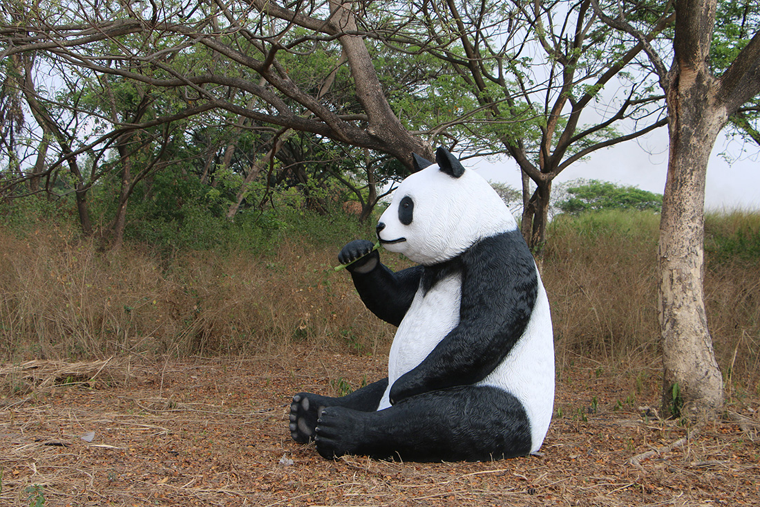 Giant Sitting Panda Bear Eating Fiberglass Statue
