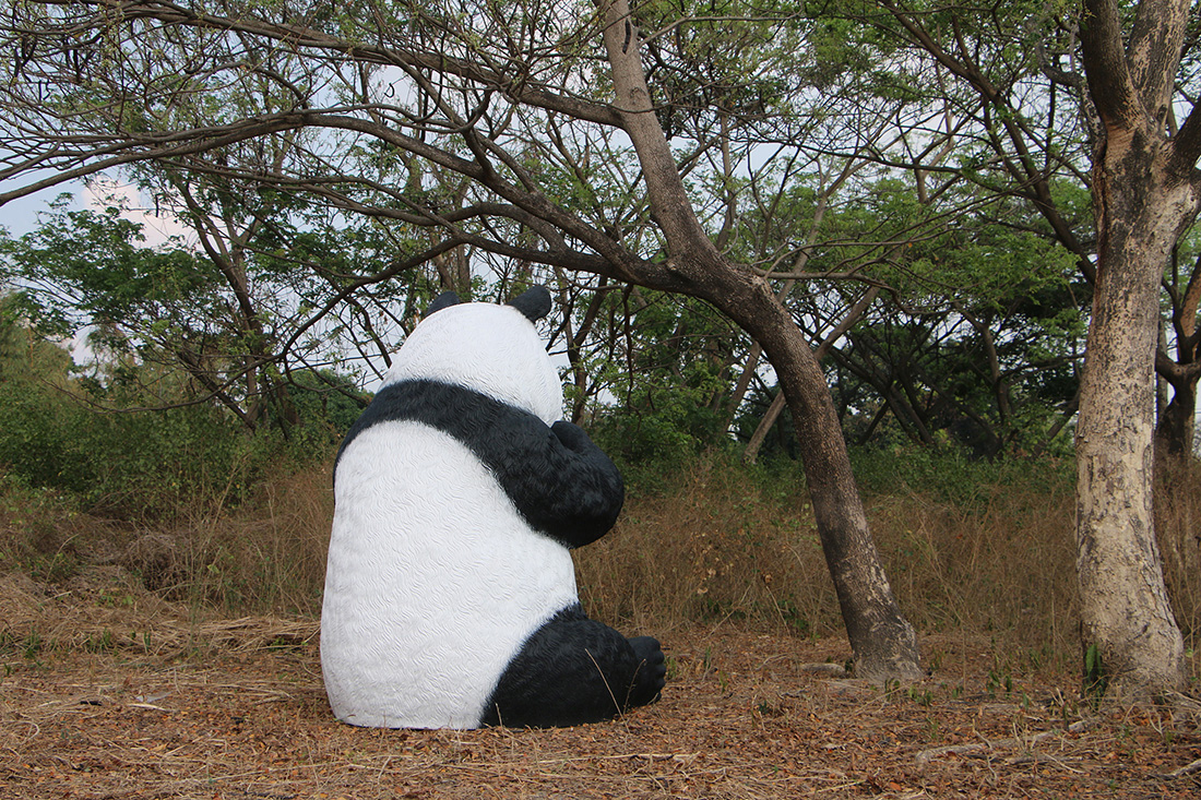 Giant Sitting Panda Bear Eating Fiberglass Statue