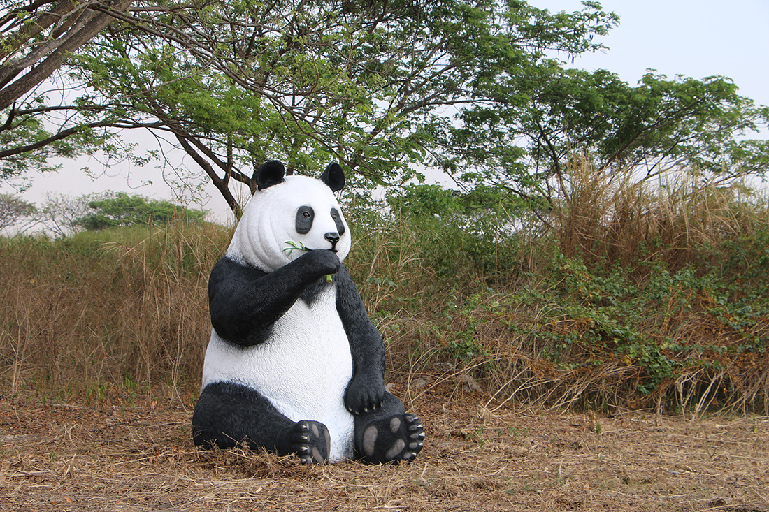 Giant Sitting Panda Bear Eating Fiberglass Statue