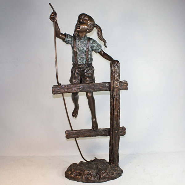 Girl climbing Fence Bronze